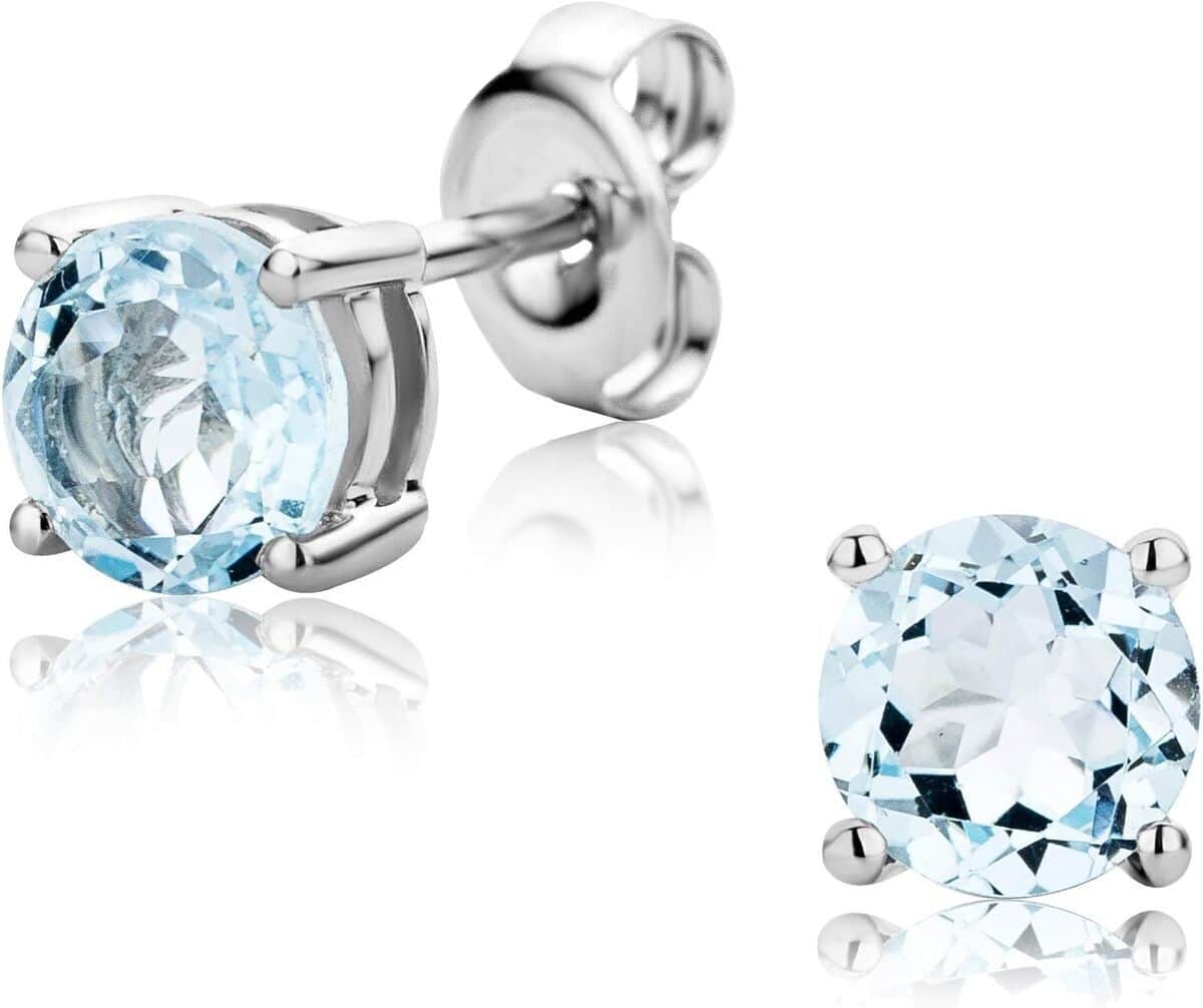 Avis sur les boucles d'oreilles Orovi en or et topaze